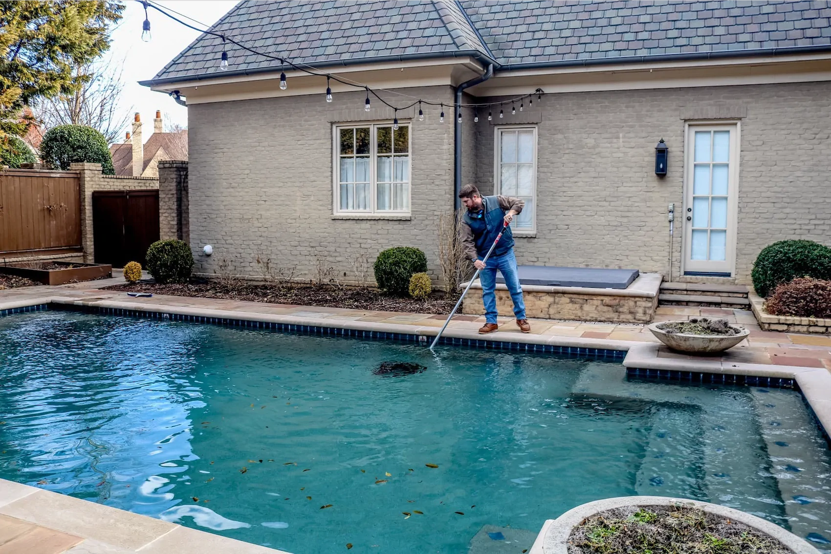 pool brush cleaning is included in our weekly pool maintenance service from Ogden Pools in Memphis, TN