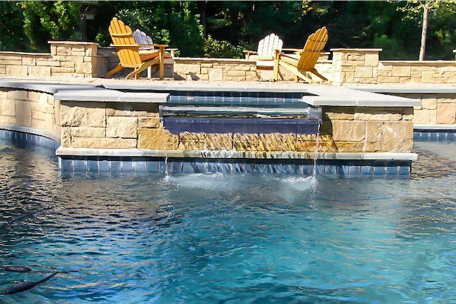custom pool featuring spillover spa renovation project by ogden pools in Memphis, TN